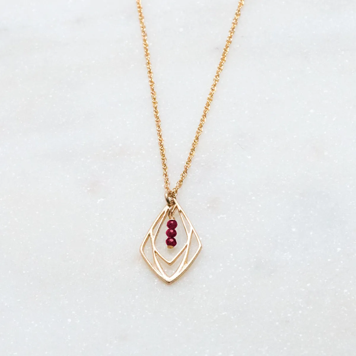 New Deco - three-stone deco pendant necklace - ruby - gold only