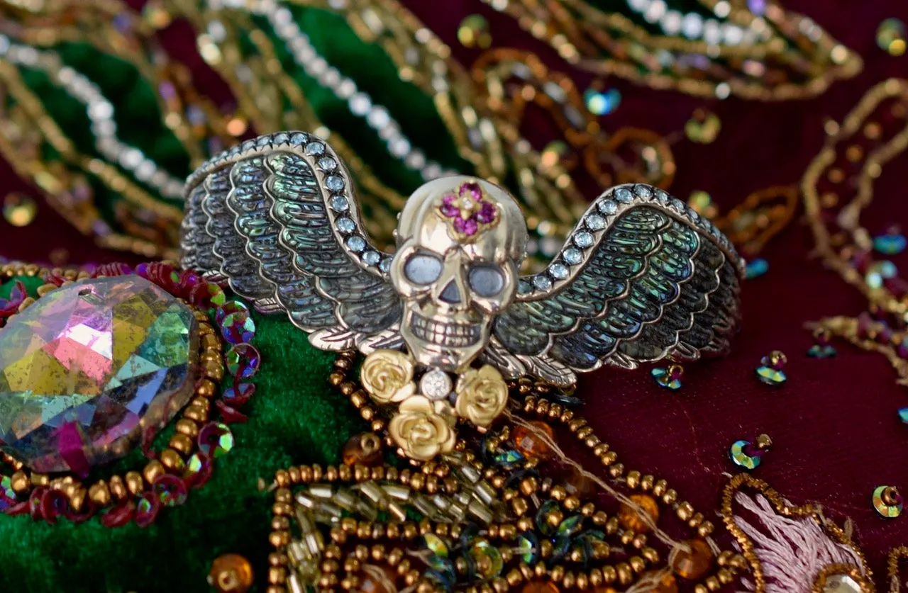 Roses Never Die Skull Cuff – Diamond, Blue Topaz, Abalone & Pink Garnet