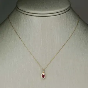 Ruby & Diamond Accented Oval Halo Pendant on 18" Chain Necklace in 10/14K Yellow Gold