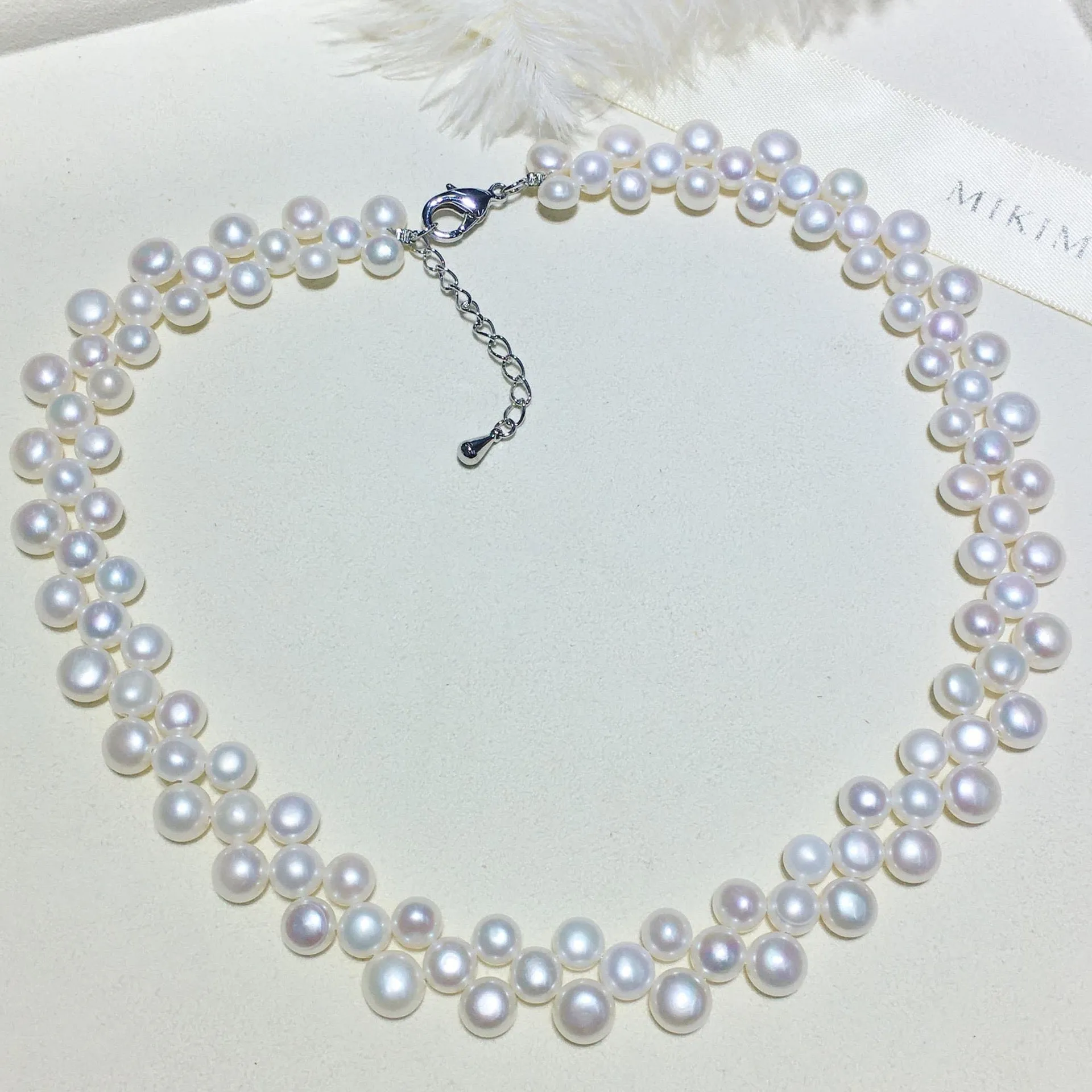 White Triple-Layer Button Pearl Strand Necklace