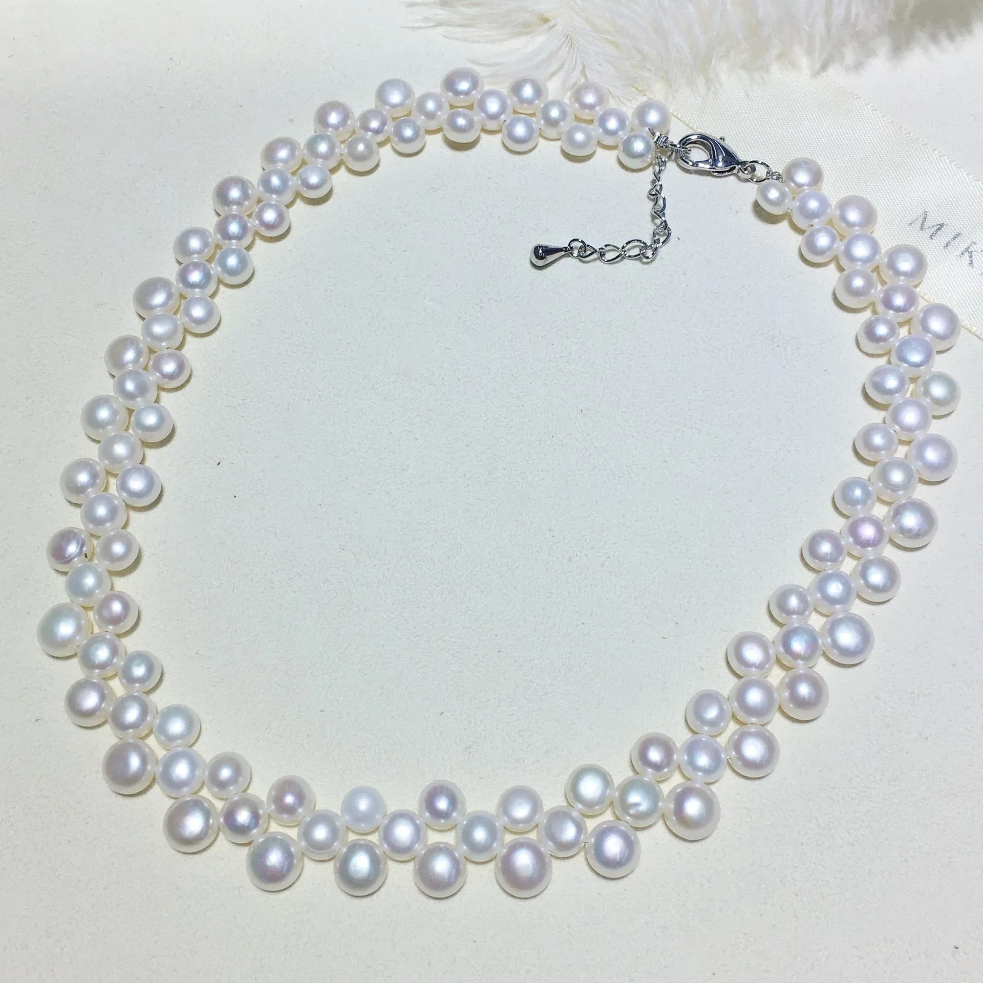 White Triple-Layer Button Pearl Strand Necklace